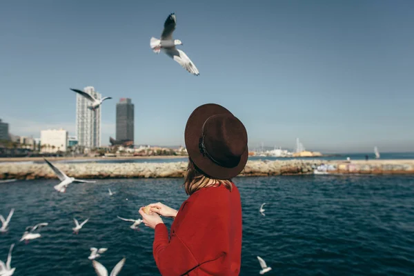 girl birds sea freedom happiness Barcelona Spain