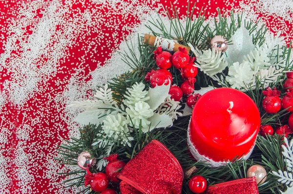Christmas wreath with a candle in the center for decoration — Stock Photo, Image
