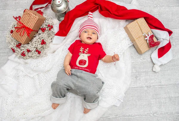 Niña de Navidad seis meses en la víspera de Navidad con gif —  Fotos de Stock