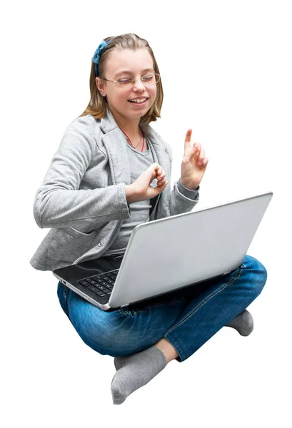 Boldog tinédzser lány ül egy laptop — Stock Fotó