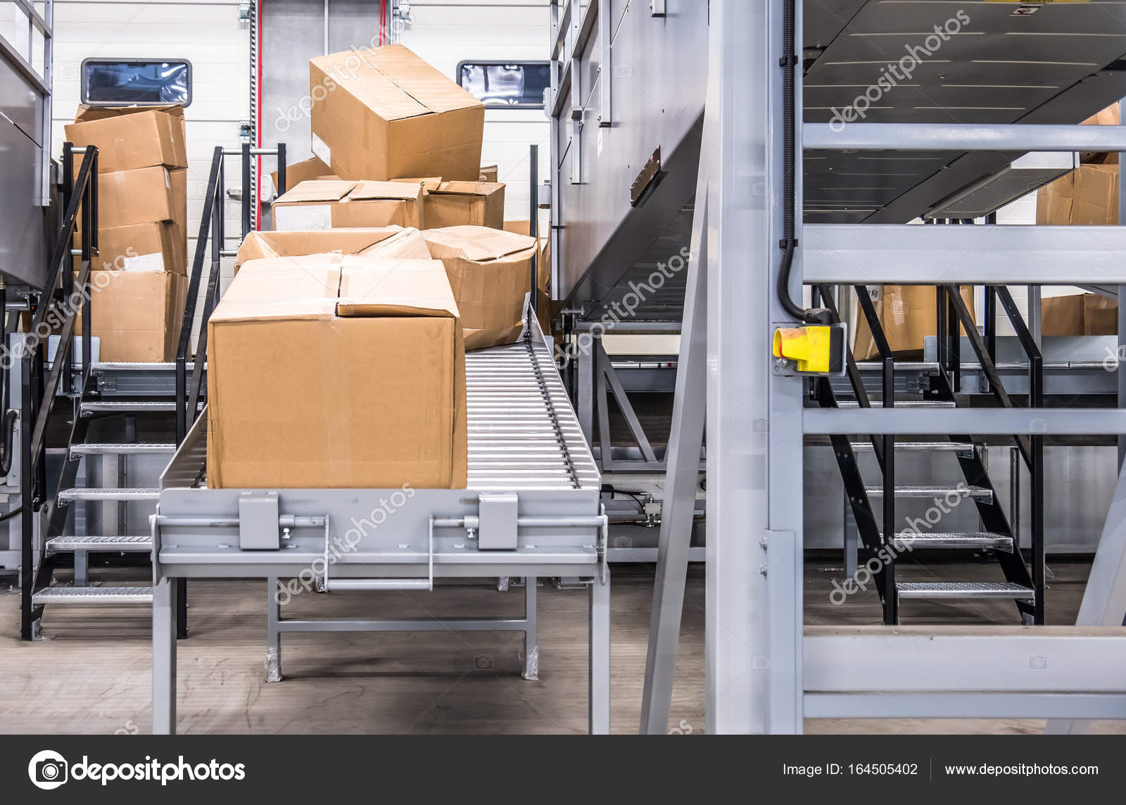 Parcels transported on conveyors Stock Photo by ©Lukassek 164505402