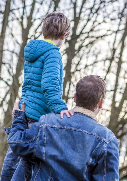 Father being an everyday superhero guiding and helping son and daughter — Stock Photo, Image