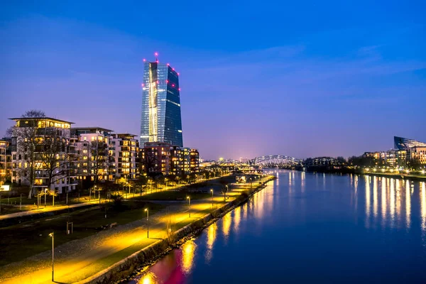 The skyline of Frankfurt, Germany, with the European Central Bank tower at night - All logos and brands removed — Stock Photo, Image