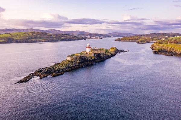 Aerial of the Rotten Island Lighthouse with Killybegs in background - County Donegal - Írország — Stock Fotó