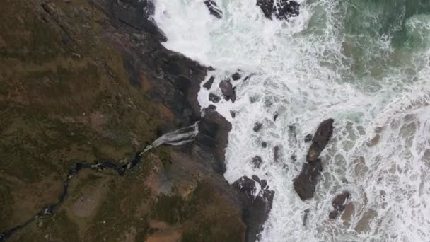 Aerial view of the beautiful waterfall at the coast at Malin Beg looking in County Donegal, Ireland. — 비디오
