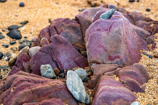 Kinnagoe bay in County Donegal, Inishowen has an extraordinary selection of colourful stones- Ireland — Stock Photo, Image