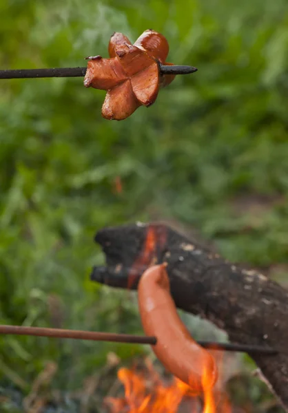 Sausages on a stick — Stock Photo, Image