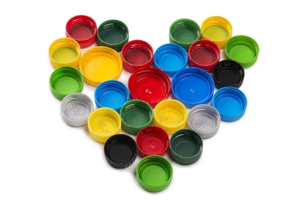 Tampas de garrafa de plástico colorido — Fotografia de Stock