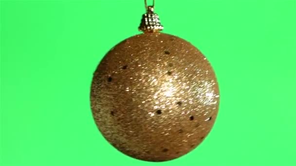 緑の画面の背景に黄金の泡 クリスマスの装飾 — ストック動画