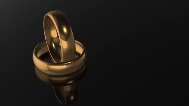 Rendering Two Anillos Boda Oro Sobre Fondo Negro Loopable — Vídeo de stock