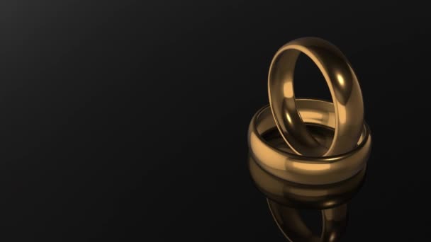 Rendering Two Anillos Boda Oro Sobre Fondo Negro Loopable — Vídeo de stock