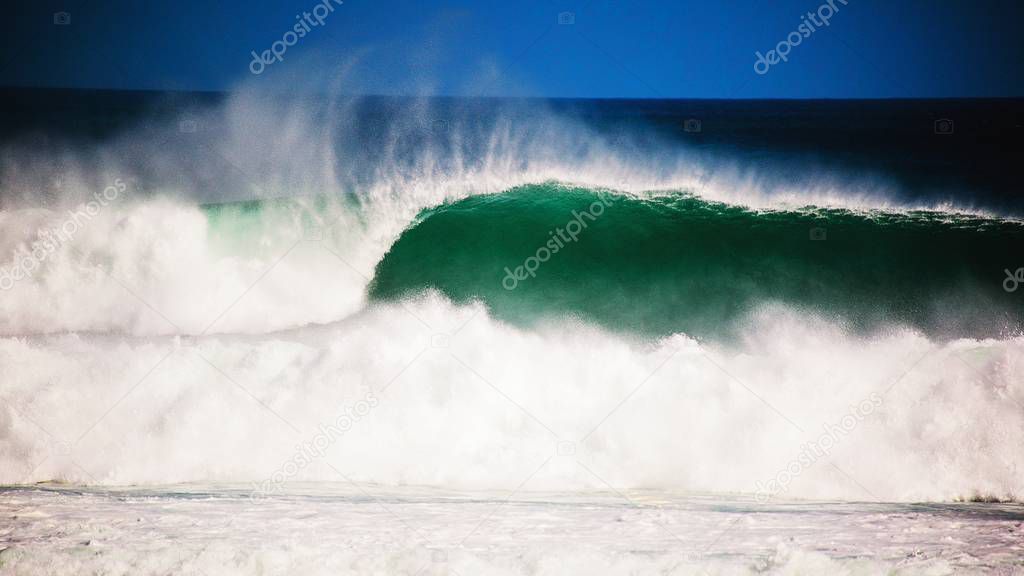 Breaking surfing ocean waves