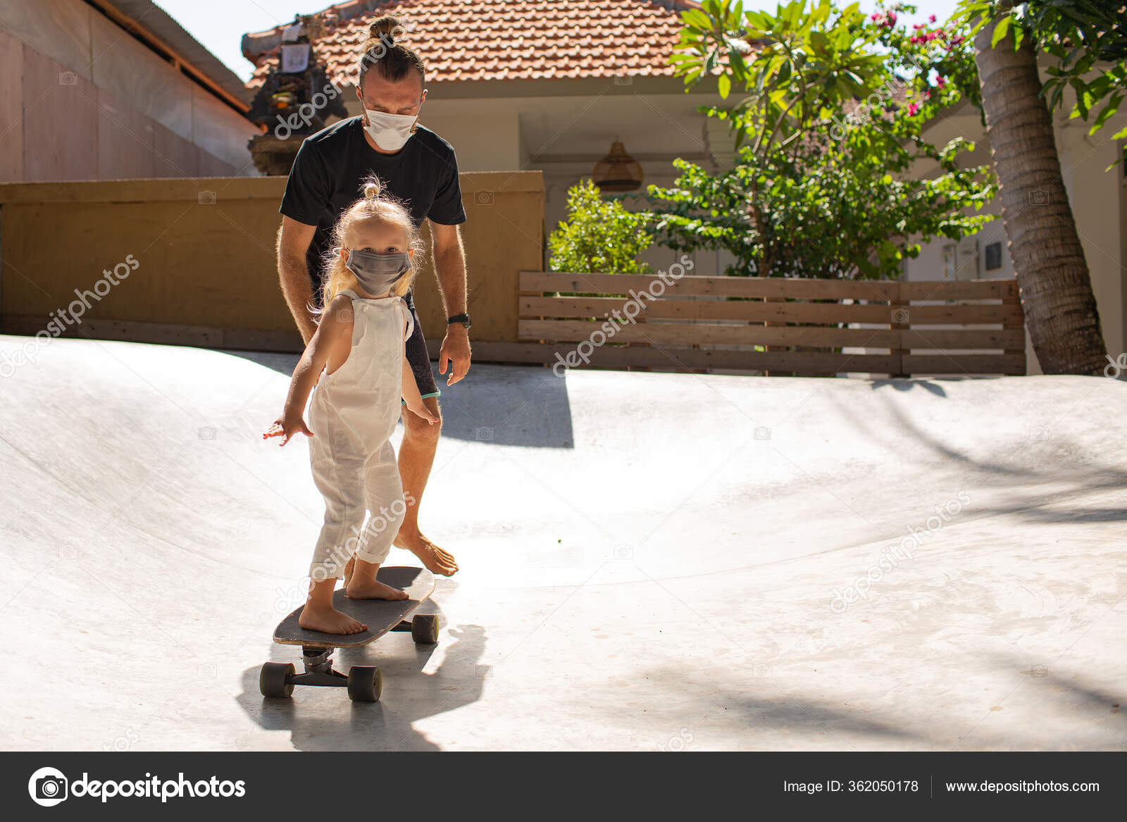 Father Daughter Riding Skateboard Together Stock Photo by ©alexzhilkin  362050178