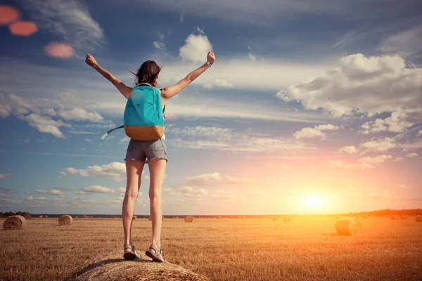 Girl with outspread hands outdoors — Stock Photo, Image