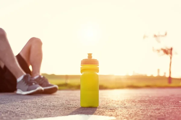 Spor plastik şişe su parkı ve arka plan, sporcu