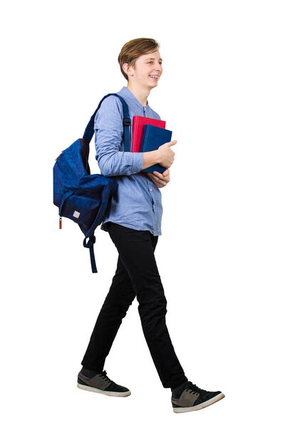Full length portrait of confident student boy going to school ho