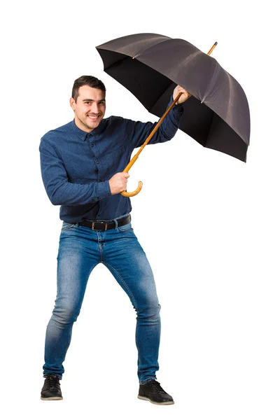 Full length of cheerful businessman hiding behind his open umbre — Stock Photo, Image