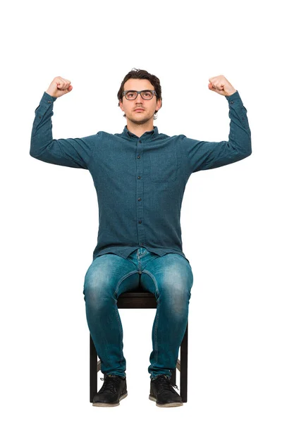 Full Length Confident Businessman Seated Chair Flexes Muscles Imagine Superpower — Stock Photo, Image