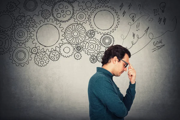 Hombre Negocios Wistful Mantiene Dedo Índice Frente Pensamiento Duro Diferentes —  Fotos de Stock