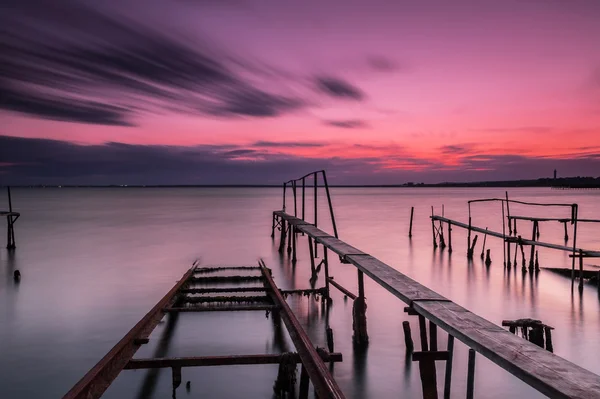 Pôr do sol sobre a praia — Fotografia de Stock