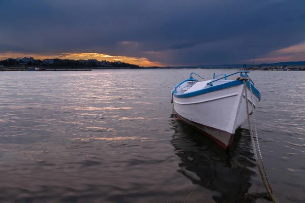 Fishing boat at sunset — Stock Photo, Image