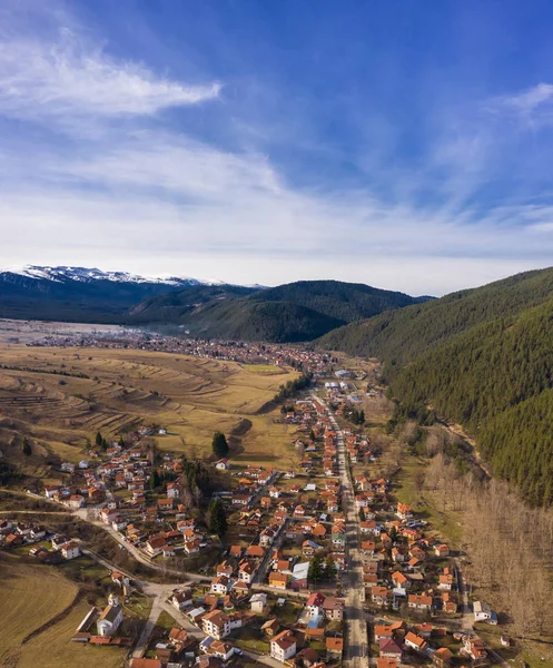 View from drone to village in the mountain. Village Govedarci in Rila mountains, Bulgaria