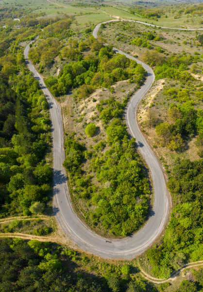 Aerial view from drone to the road through mountain