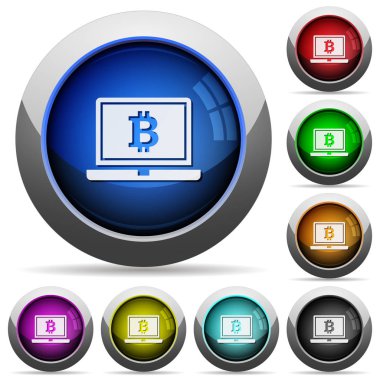 Dizüstü Bitcoin işareti ile yuvarlak parlak düğmeler