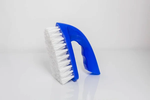 Blue a brush for cleaning close-up — Stock Photo, Image