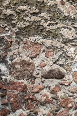 Çimento granit taş duvar kağıdı. Desen gri kırmızı tarzı sert yuvarlak dekoratif gerçek taş duvar yüzeyi ile çimento.