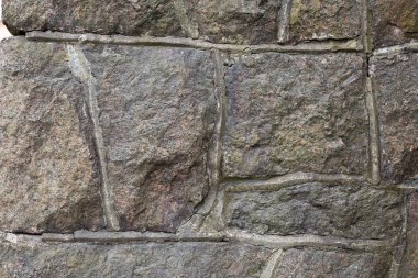 Çimento granit taş duvar kağıdı. Desen gri kırmızı tarzı sert yuvarlak dekoratif gerçek taş duvar yüzeyi ile çimento.