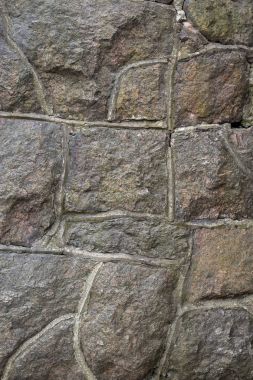 Çimento granit taş duvar kağıdı. Desen gri kırmızı tarzı sert yuvarlak dekoratif gerçek taş duvar yüzeyi ile çimento.