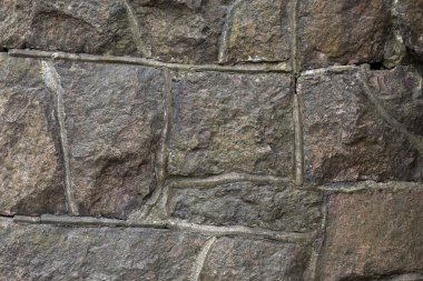 Çimento granit taş duvar kağıdı. Desen gri kırmızı tarzı sert yuvarlak dekoratif gerçek taş duvar yüzeyi ile çimento.