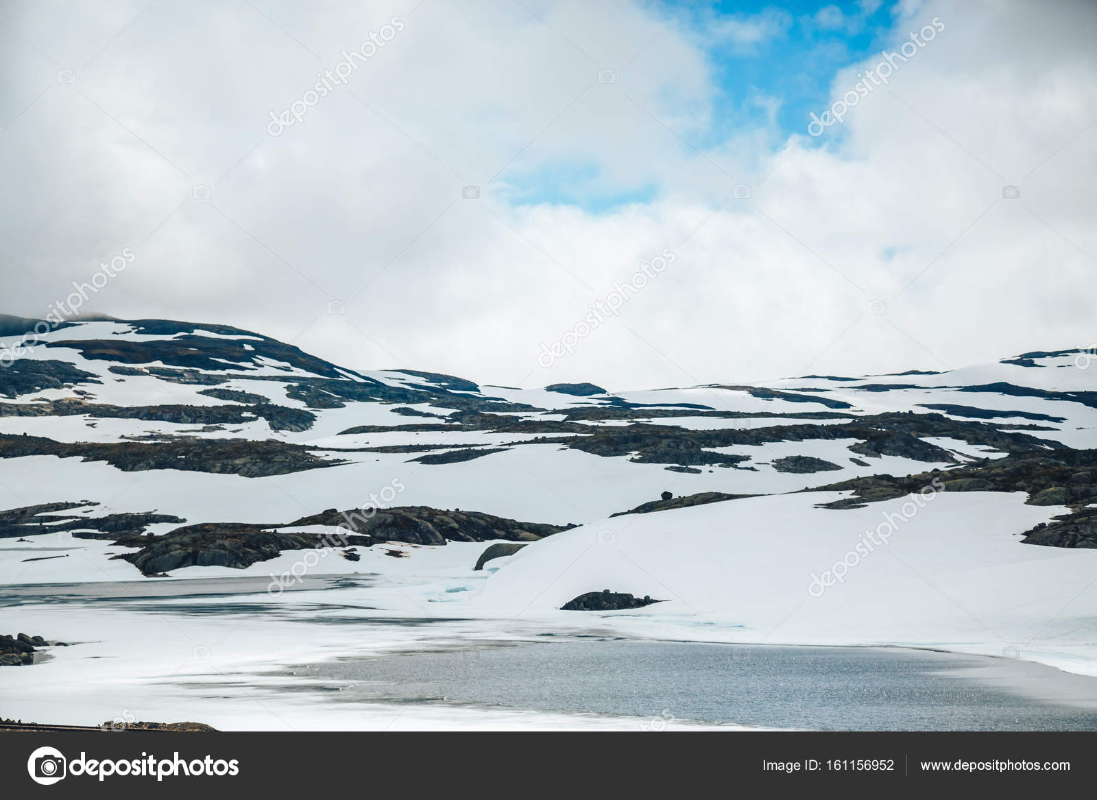 Snowy Mountain Landscape With Lake And Rocks National Tourist Route Rallarvegen Norway Stock Photo By C Photografspb Snowy Mountain Landscape With Lake And Rocks National Tourist Route Rallarvegen Norway Stock Photo By C Photografspb