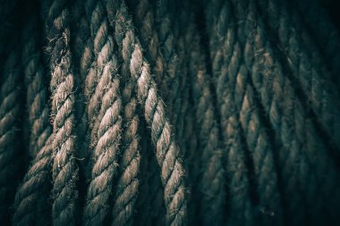 Koyu arka plan doku sarmal deniz veya deniz ip. Satır demirleme kaynaştırılması doku. Yakın çekim