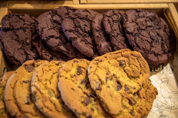 Closeup of a group of assorted cookies. Chocolate chip, oatmeal raisin, white chocolate fill the frame. — Stock Photo, Image
