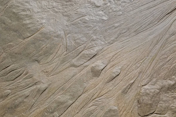 Figure en forme de lignes courbes dans le sable sur la plage, mak — Photo