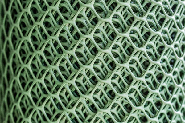 Esteira de exercício textura close up. fundo abstrato de esteira de borracha verde — Fotografia de Stock