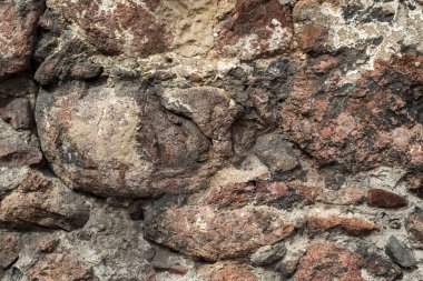 Çimento granit taş duvar kağıdı. Desen gri kırmızı tarzı sert yuvarlak dekoratif gerçek taş duvar yüzeyi ile çimento.