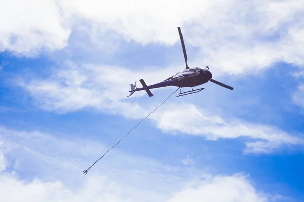 Helicopter and rope — Stock Photo, Image