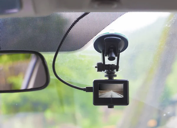 Dvr camera on car windshield — Stock Photo, Image