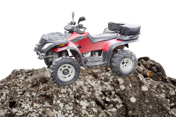 Quadów ATV na góry skały na białym tle — Zdjęcie stockowe