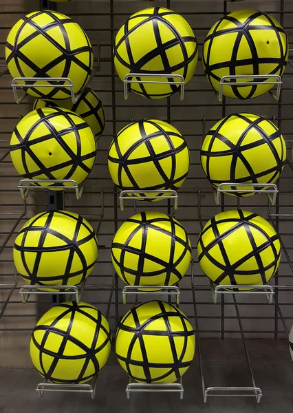 Soccer balls for sale on shelf — Stock Photo, Image