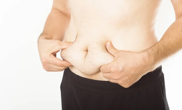 Man holding belly fat concept — Stock Photo, Image