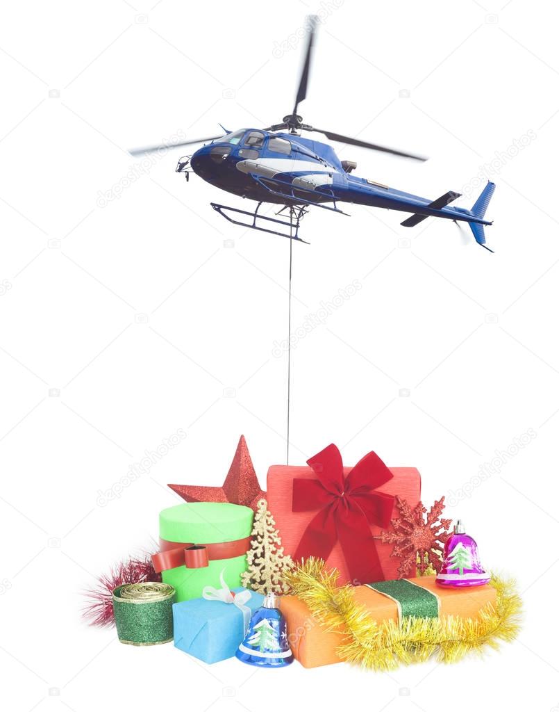 helicopter with christmas gifts delivery concept