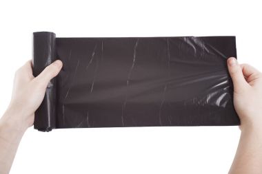 çöp veya çöp torbaları bir işareti olarak holding eller