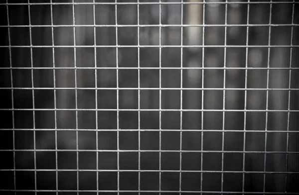 abstract photo of iron bars from jail or fence