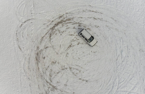 car drifting n snow. aerial view
