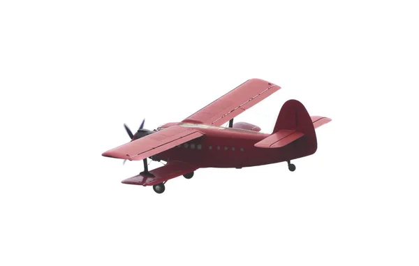 Rotes Oldtimer-Flugzeug fliegt am Himmel — Stockfoto