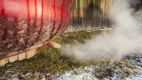 pollution with car smoke on the grass. eco concept